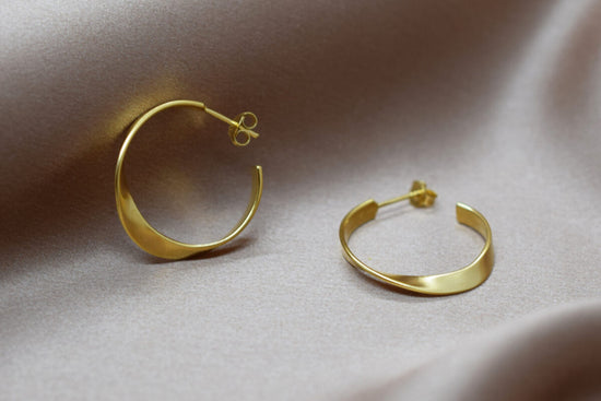 Load image into Gallery viewer, Twisted Hoop Earrings - Gold Plated
